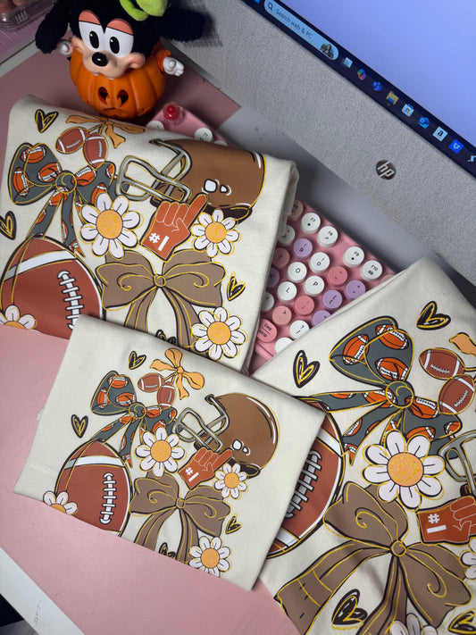 football & bows beige tee
