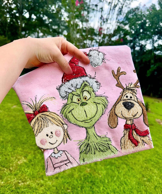 green guy with friends pink tee
