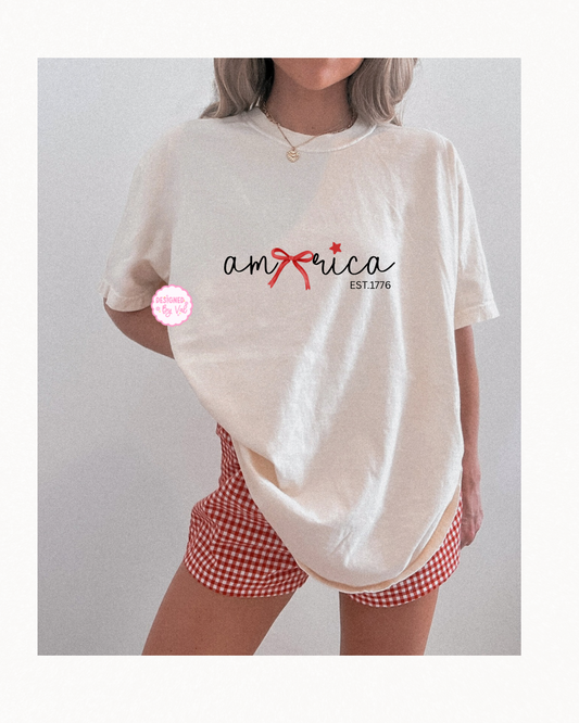 america with bow beige tee
